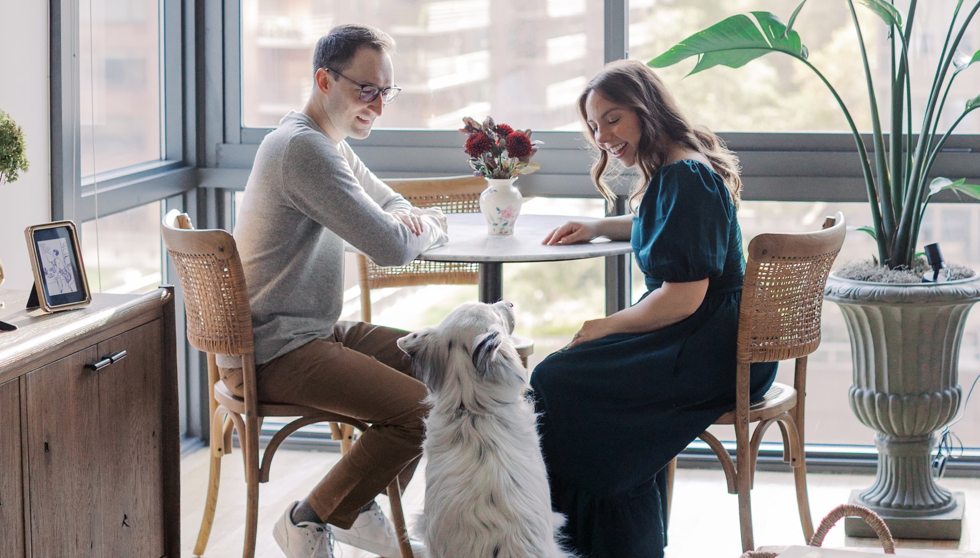 Emily and Justin Sitting at Their Dining Room Table