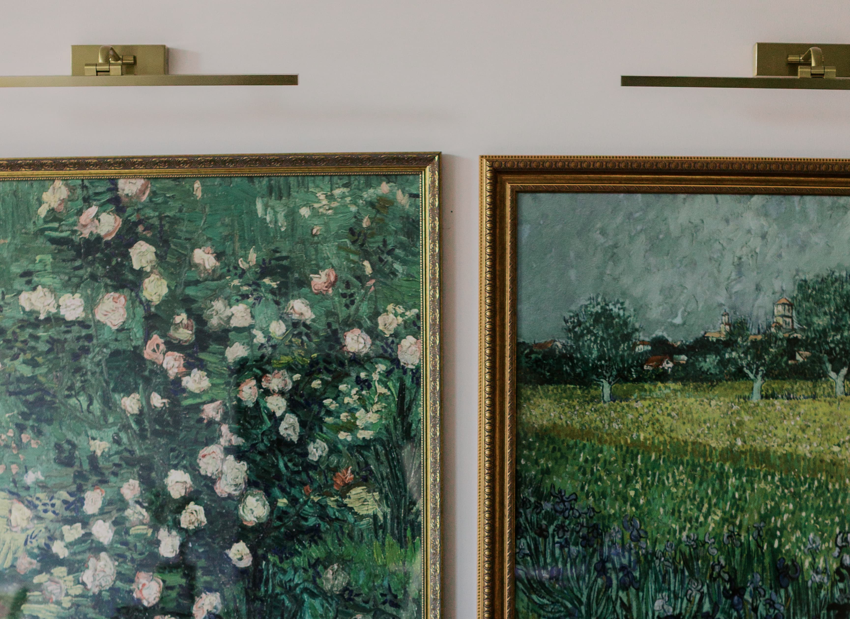 Artistic wall arrangement with gold frames